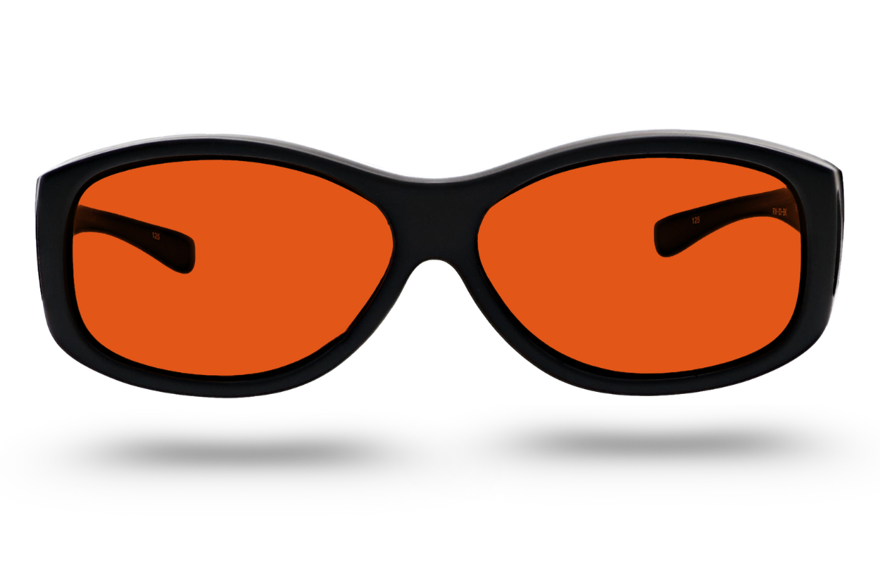 Gafas de protección dental con filtro naranja para proteger la vista durante tratamientos odontológicos en Madrid